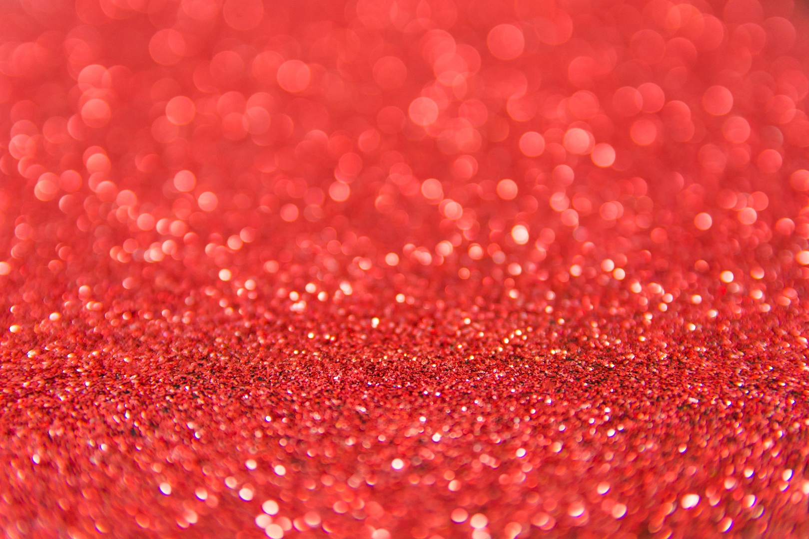 red_glitter_on_a_red_background.png